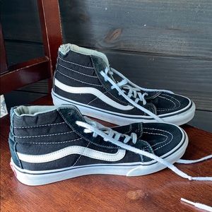 Vans sk8-hi in black and white.